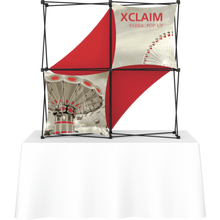 Load image into Gallery viewer, Xclaim 5ft Tabletop 2 Quad x 2 Quad 59.11&quot;W x 59.42&quot;H x 12.8&quot;D Fabric Popup Display Kit
