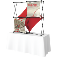 Load image into Gallery viewer, Xclaim 5ft Tabletop 2 Quad x 2 Quad 59.11&quot;W x 59.42&quot;H x 12.8&quot;D Fabric Popup Display Kit
